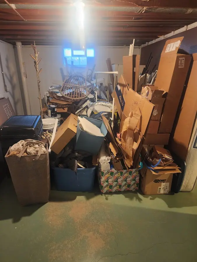 Roll-off dumpster container at job site for Roll Off Dumpster Rental in Smyrna